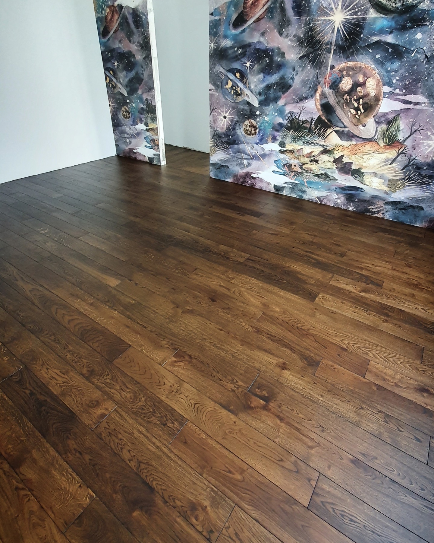 Dark finished solid oak flooring in a residential apartment