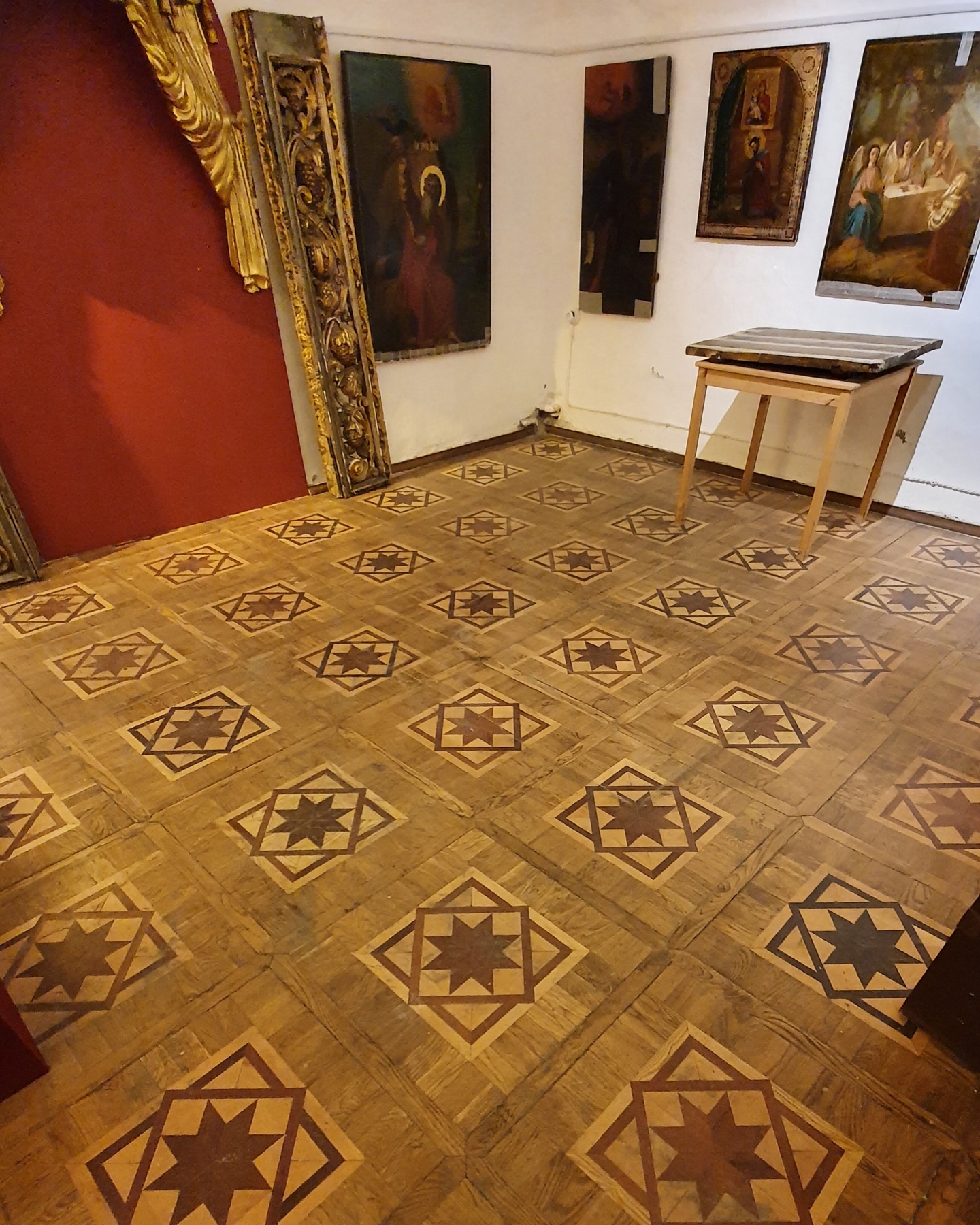 Historical mosaic parquet before restoration work began