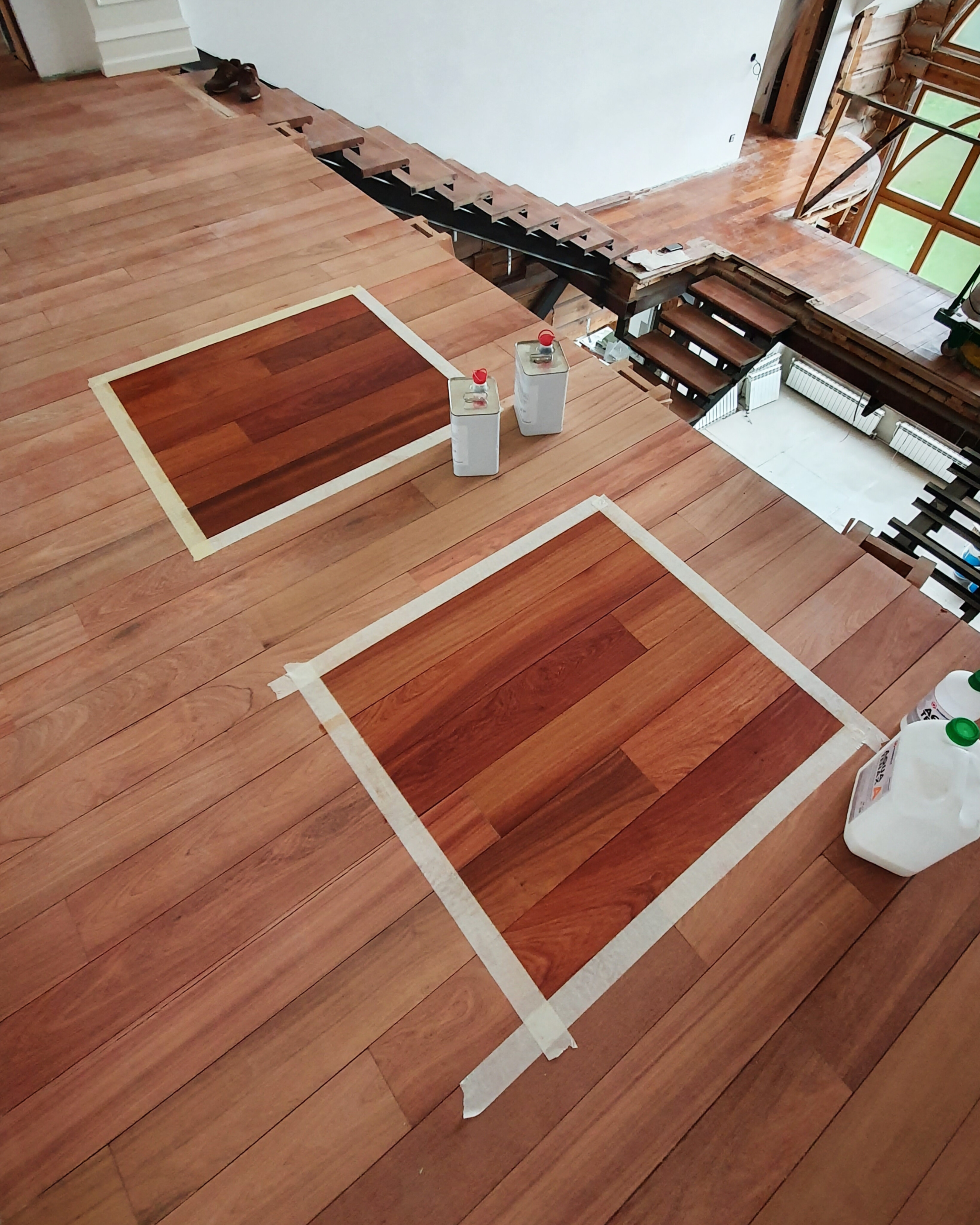 Color sample testing on padauk flooring before the final finishing system was selected