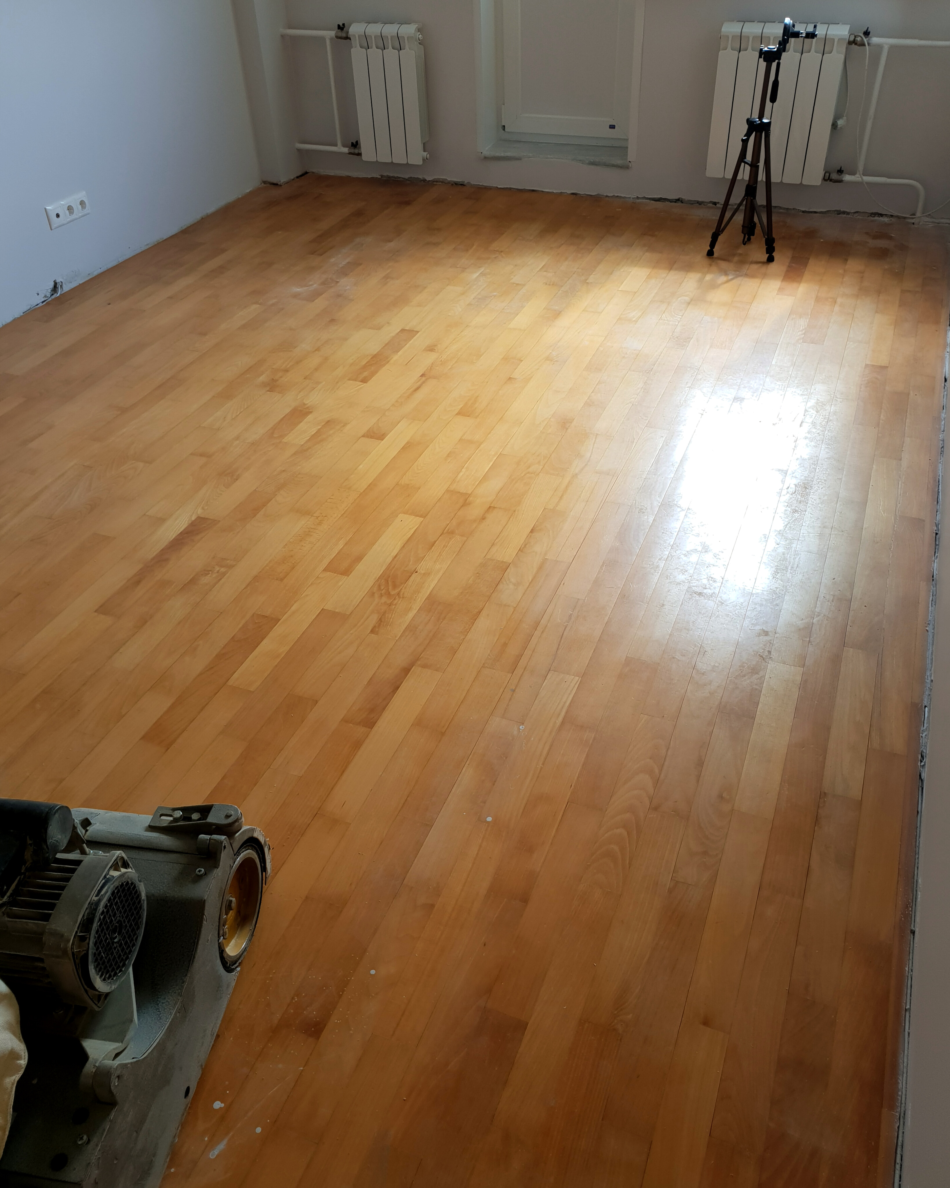 Existing beech parquet floor before sanding and white oil toning