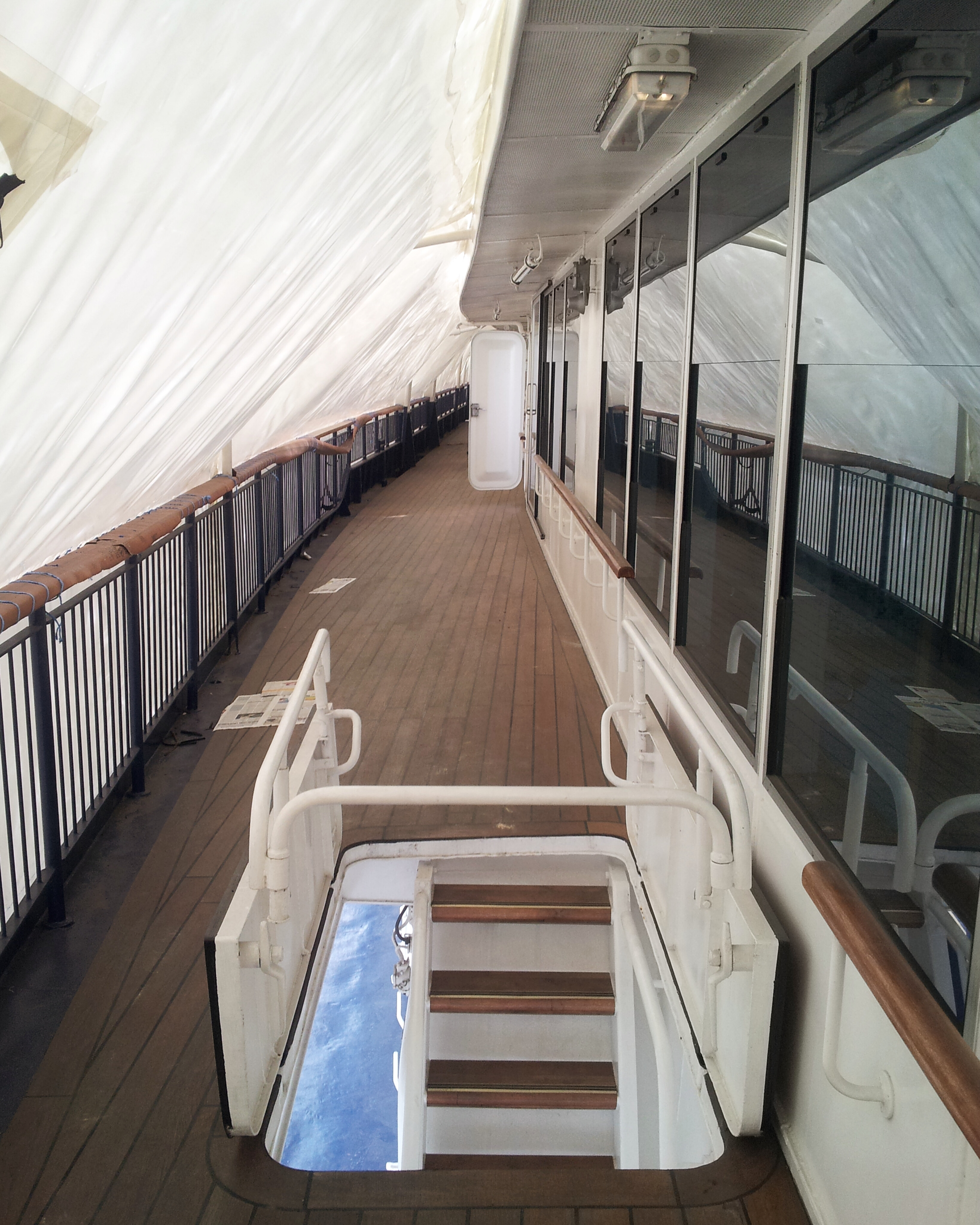 Long ship deck section showing the scale of the teak restoration project