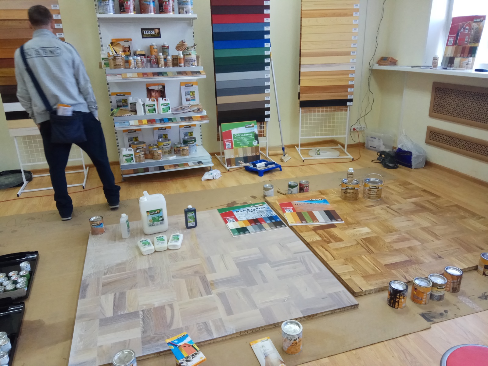 Saicos training showroom with finishing samples and product displays.